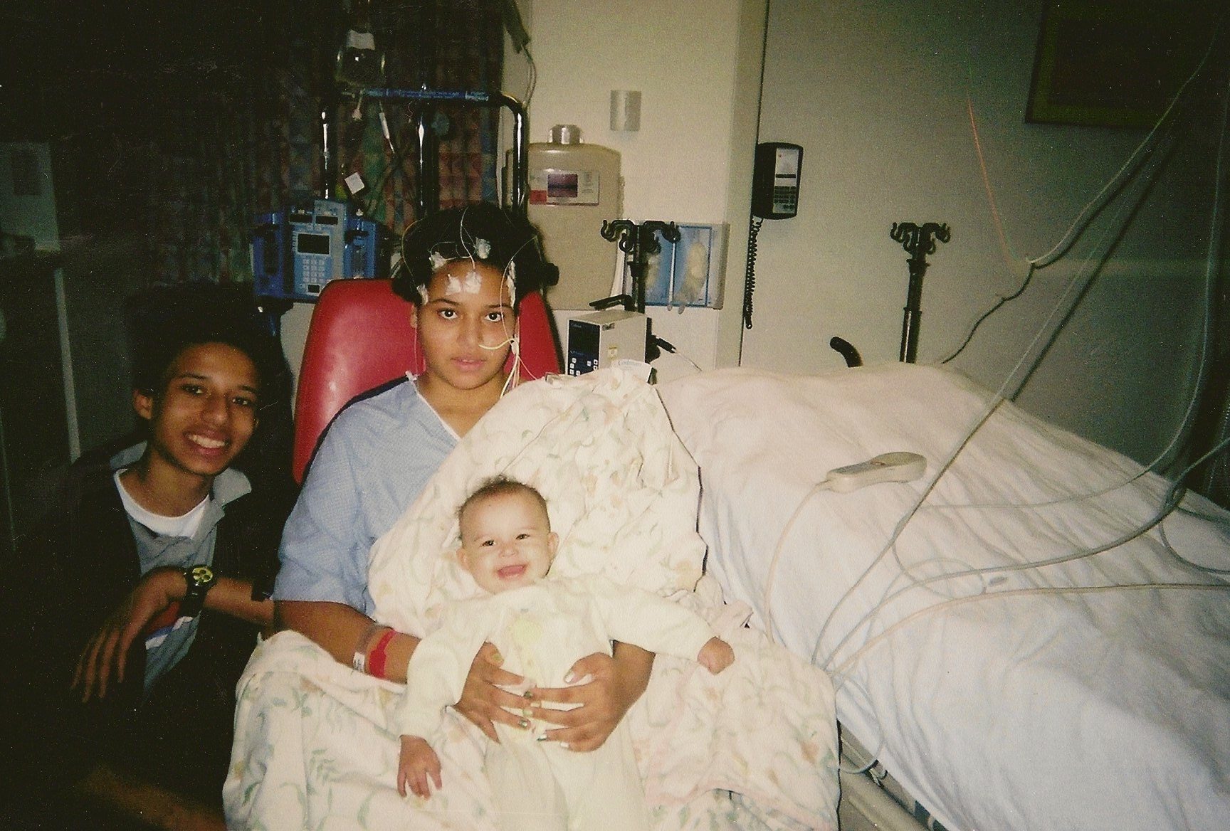 Chaunell in the hospital with Cordell and baby Jameelah