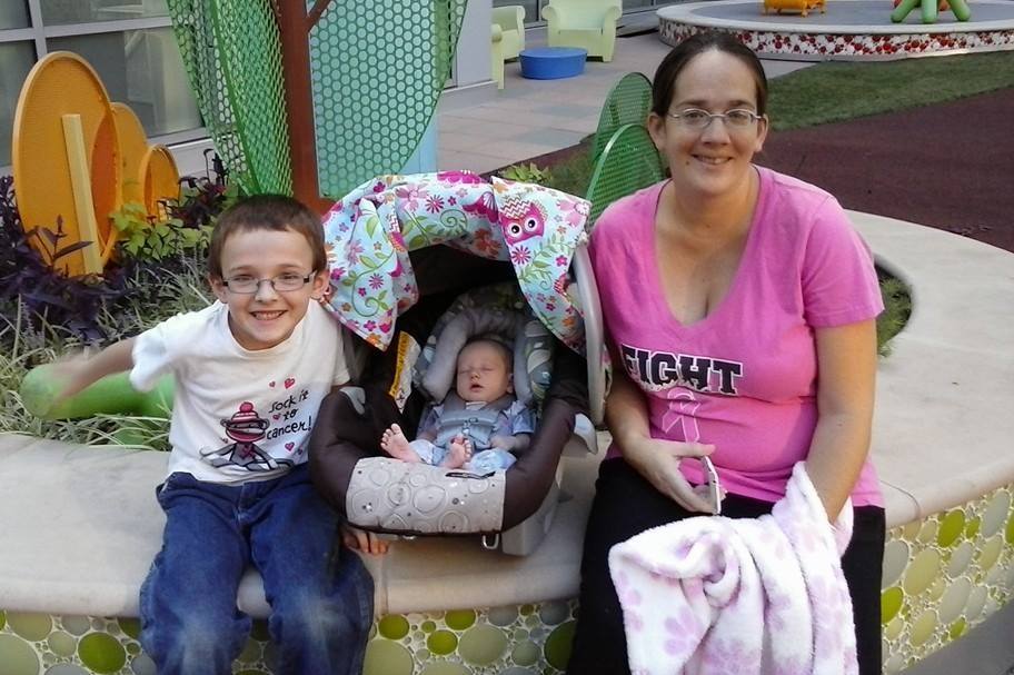 Hope with mom and brother